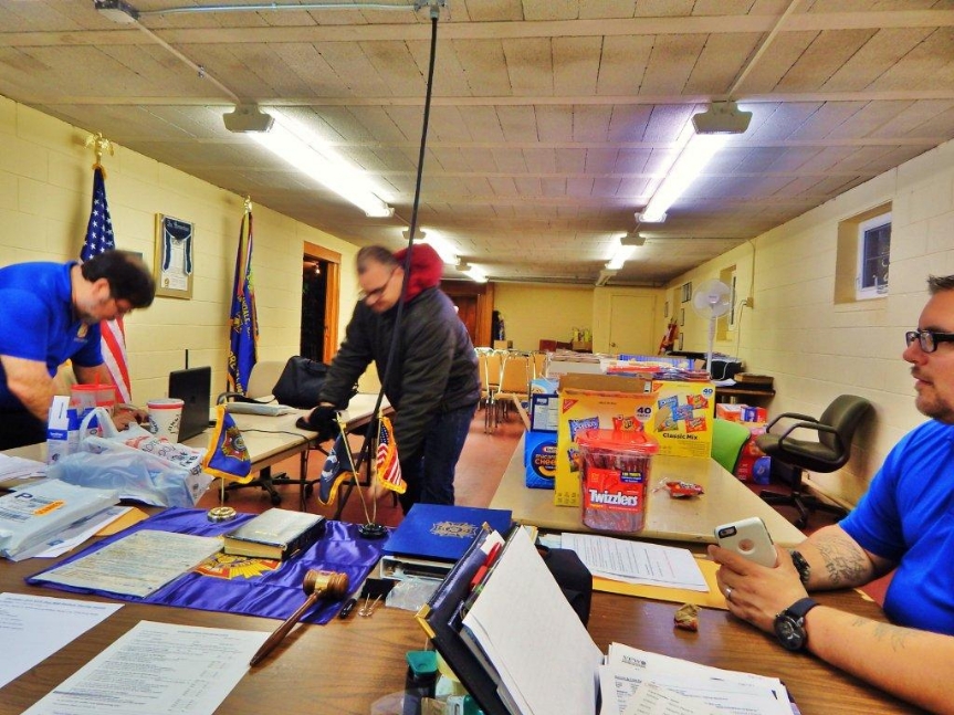 Members of Post 9668 assembled 18 boxes that will be sent to our comrades overseas.